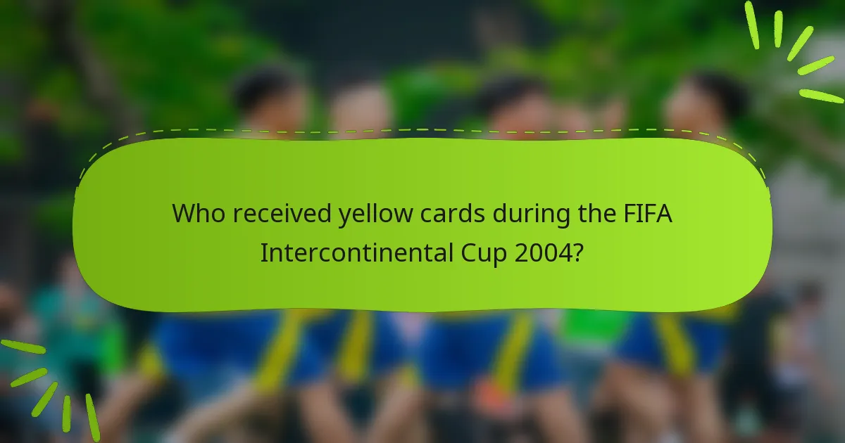 Who received yellow cards during the FIFA Intercontinental Cup 2004?